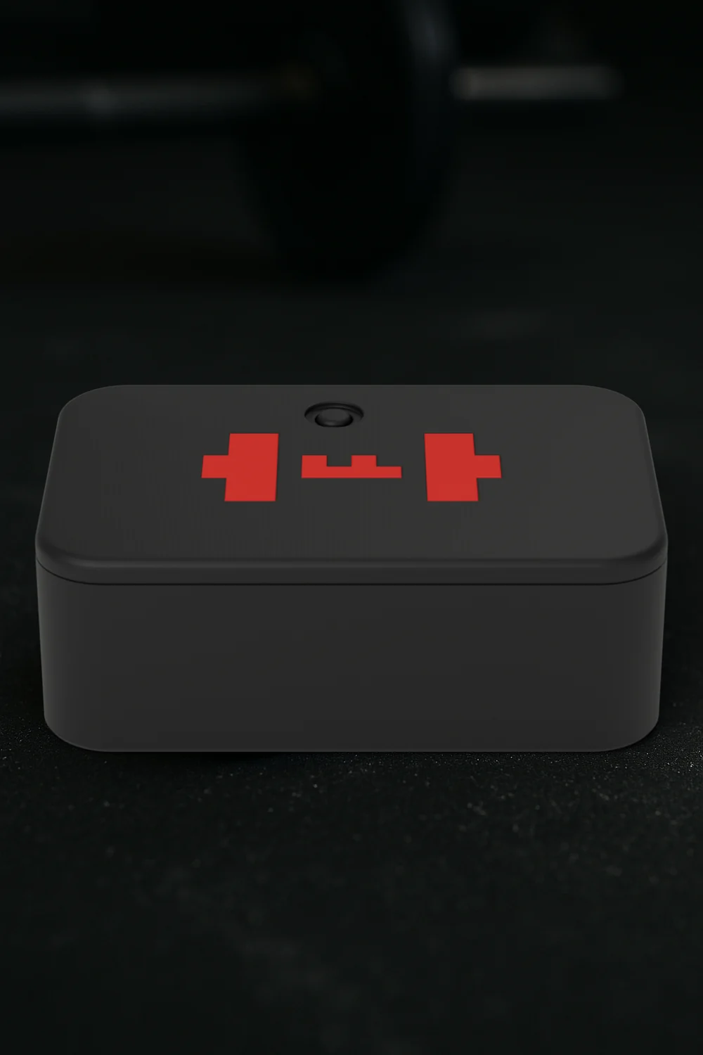 Render: the TEMPO ANVIL on a rubber gym floor, a barbell out of focus behind it